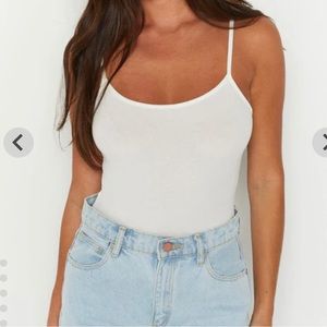 New Beginning Boutique white ribbed bodysuit